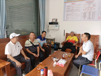 茂名市老科协指导果农做好龙眼产期调控管理技术