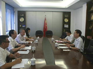 何真会见中国邮储银行广东省分行行长刘义龙一行