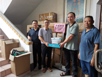 梅州市平远县科协向差干学校受灾学子捐赠科普用品